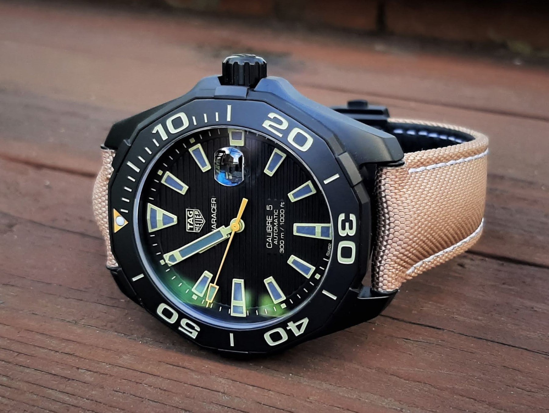 Shop Authentic Tag Heuer Aquaracer 300 Calibre 5 Automatic Black Dial Brown Fabric Strap Watch for Men - WAY208C.FC6383 - Luxxuri