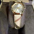 Shop Authentic Burberry The City Gold Dial Haymarket Brown Leather Strap Watch for Women - BU9219 - Luxxuri