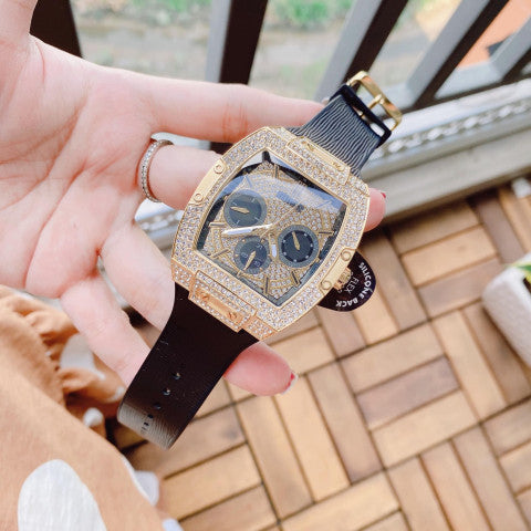 Shop Authentic Guess Phoenix Multifunction Crystals Gold Dial Black Silicone Strap Watch For Men - GW0048G2 - Luxxuri