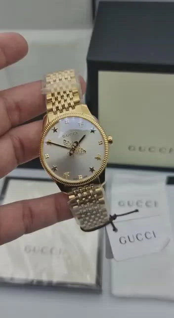 Shop Authentic Gucci G Timeless Quartz Silver Dial Gold Steel Strap Watch For Women - YA1264155 - Luxxuri
