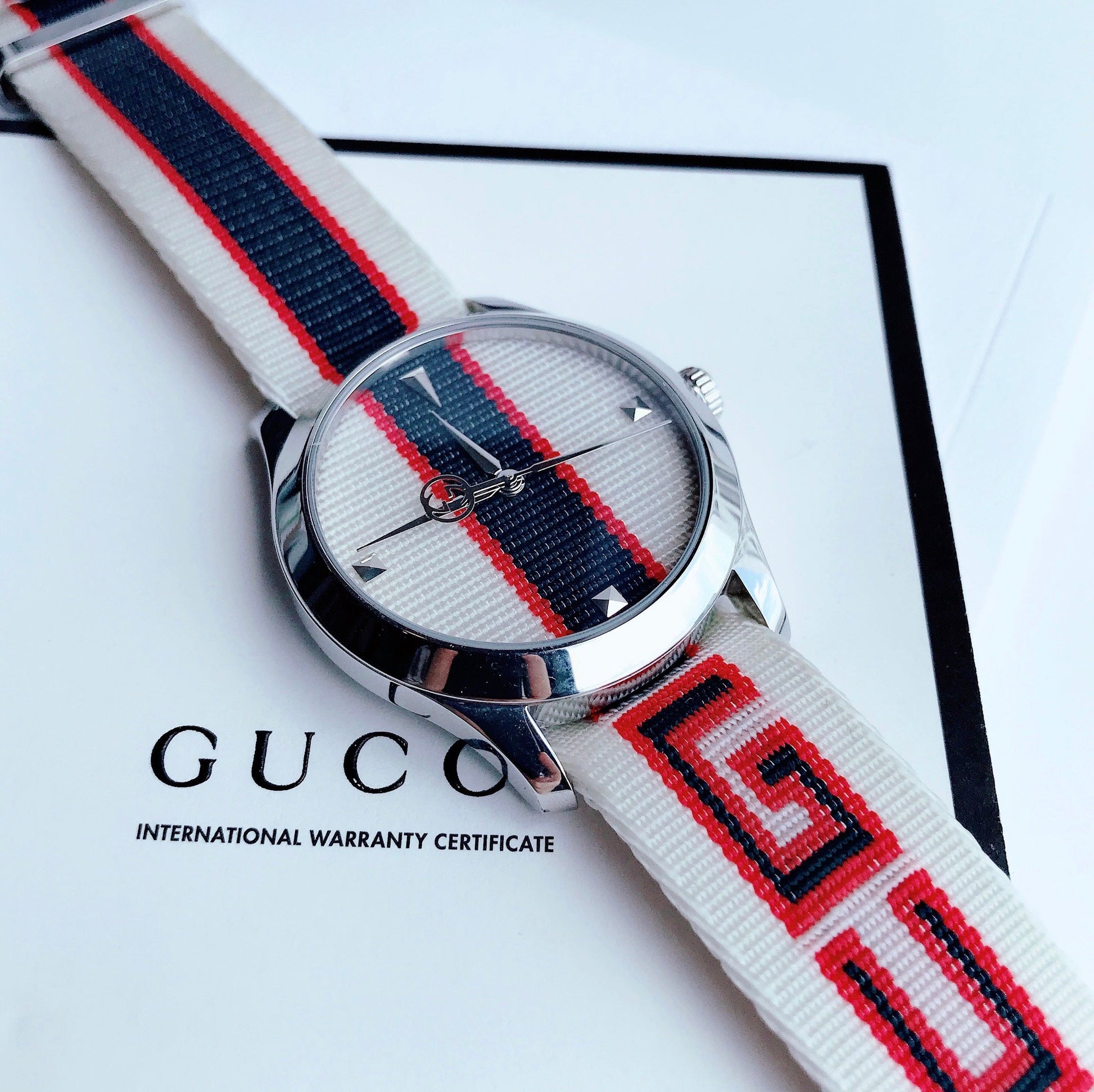Shop Authentic Gucci G Timeless Quartz White Dial Two Tone NATO Strap Watch For Men - YA1264071 - Luxxuri
