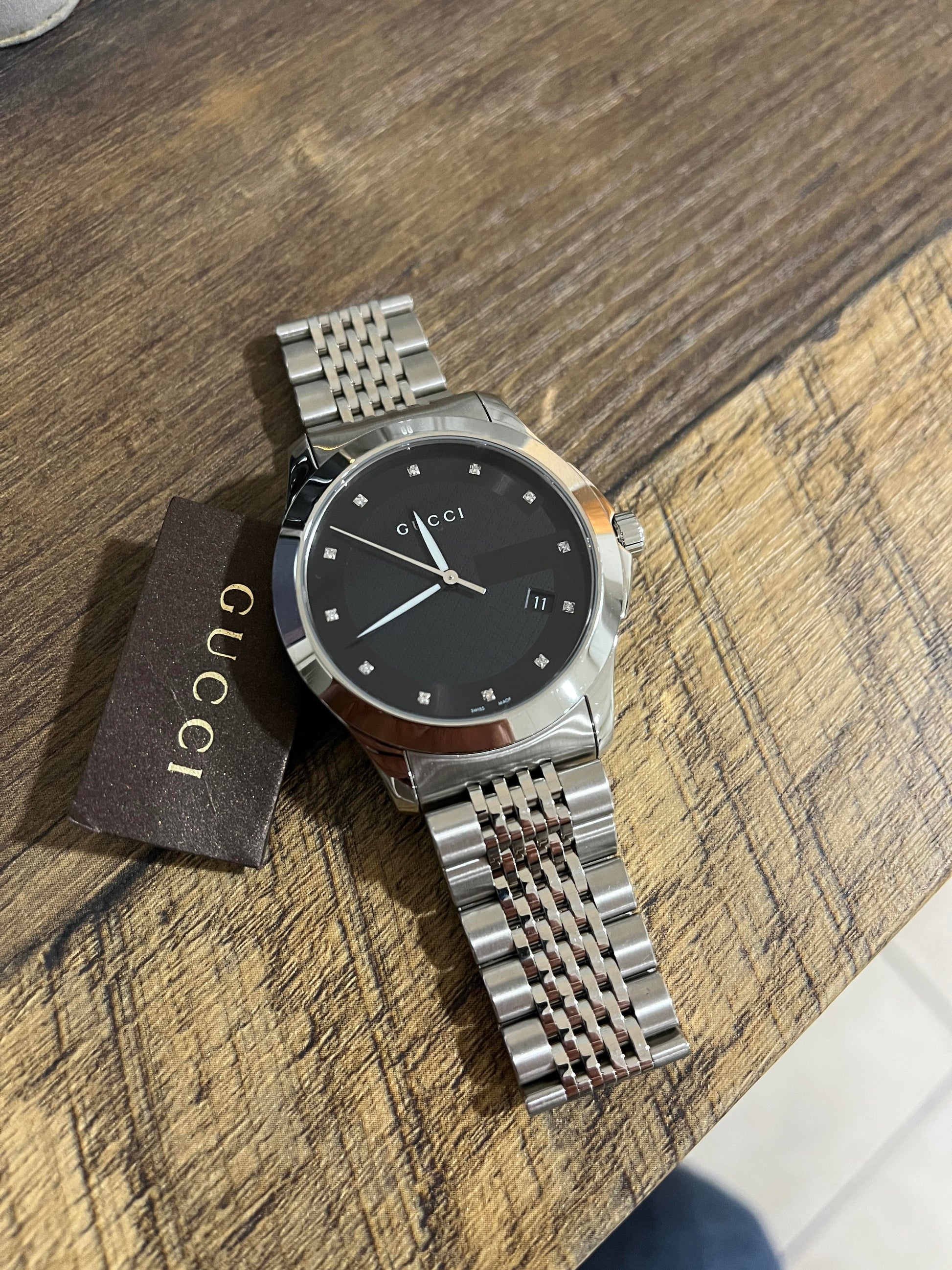 Shop Authentic Gucci G Timeless Diamonds Black Dial Silver Steel Strap Watch For Men - YA126405 - Luxxuri