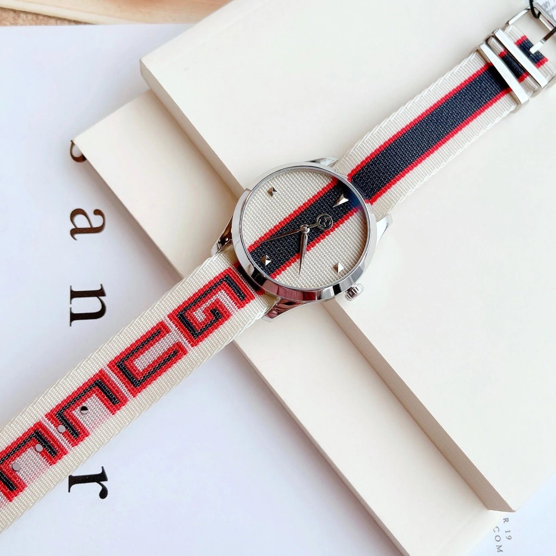Shop Authentic Gucci G Timeless Quartz White Dial Two Tone NATO Strap Watch For Men - YA1264071 - Luxxuri