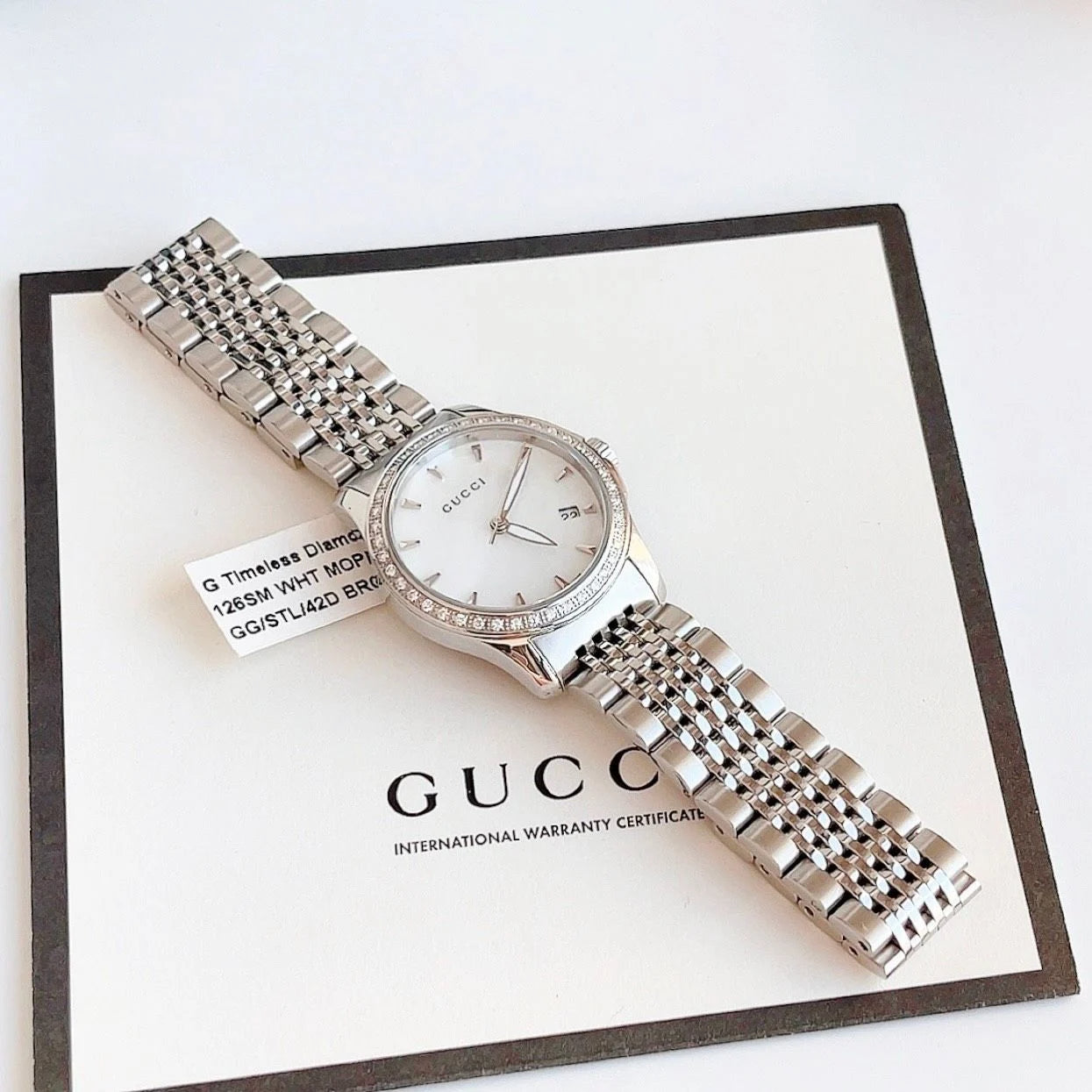 Shop Authentic Gucci G Timeless Diamonds Mother of Pearl Dial Silver Steel Strap Watch For Women - YA126506 - Luxxuri