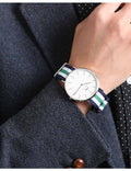  Shop Authentic Daniel Wellington Classic Nottingham White Dial Two Tone NATO Strap Watch For Men - 0208DW - Luxxuri