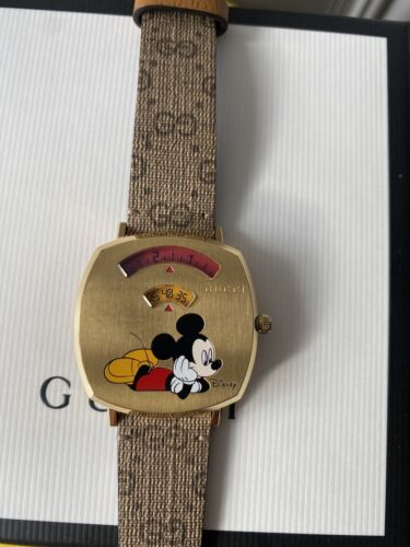  Shop Authentic Gucci Grip Disney Mickey Mouse Gold Dial Brown Leather Strap Watch For Women - YA157420 - Luxxuri