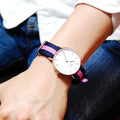 Shop Authentic Daniel Wellington Classic Winchester White Dial Three Tone Nylon Strap Watch For Women - DW00100033 - Luxxuri