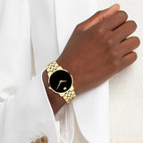  Shop Authentic Movado Museum Classic Quartz Black Dial Gold Steel Strap Watch for Men - 0607203 - Luxxuri