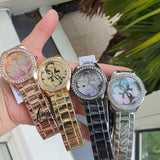  Shop Authentic Guess G Twist Diamonds Silver Dial Silver Steel Strap Watch For Women - W1201L1 - Luxxuri