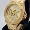  Shop Authentic Michael Kors Lennox Three-Hand Quartz Gold Dial Gold Steel Strap Watch For Men - MK8939 - Luxxuri