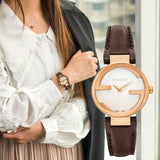  Shop Authentic Gucci G Interlocking Mother of Pearl Dial Brown Leather Strap Watch For Women - YA133516 - Luxxuri