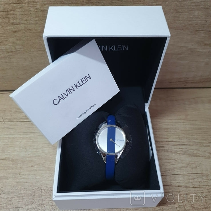  Shop Authentic Calvin Klein Rebel Blue Silver Dial Blue Leather Strap Watch for Women - K8P231V6 - Luxxuri