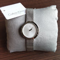  Shop Authentic Calvin Klein Firm White Dial Silver Mesh Bracelet Watch for Women - K3N23126 - Luxxuri