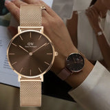  Shop Authentic Daniel Wellington Petite Melrose Brown Dial Rose Gold Mesh Strap Watch For Women - DW00100477 - Luxxuri
