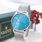  Shop Authentic Gucci G-Timeless Turquoise Mother of Pearl Dial Silver Mesh Bracelet Watch For Women - YA126582 - Luxxuri