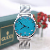  Shop Authentic Gucci G-Timeless Turquiose Mother of Pearl Dial Silver Mesh Bracelet Watch For Women - YA1264039 - Luxxuri