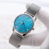  Shop Authentic Gucci G-Timeless Turquiose Mother of Pearl Dial Silver Mesh Bracelet Watch For Women - YA1264039 - Luxxuri