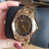  Shop Authentic Marc Jacobs Henry Transparent Gold Dial Gold Steel Strap Watch for Women - MBM3206 - Luxxuri