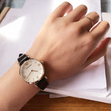  Shop Authentic Emporio Armani Gianni T-Bar Quartz Mother of Pearl Dial Black Leather Strap Watch For Women - AR1910 - Luxxuri