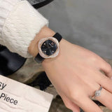  Shop Authentic Swarovski Crystal Flower Black Dial Black Leather Strap Watch for Women - 5552421 - Luxxuri
