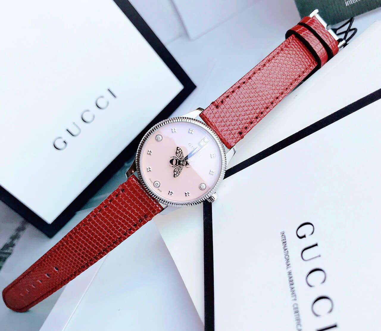 Shop Authentic Gucci G Timeless Quartz Diamonds Pink Dial Red Leather Strap Watch For Women - YA1265017 - Luxxuri