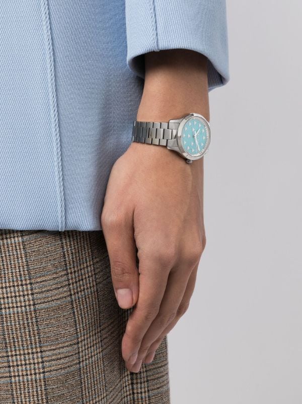  Shop Authentic Gucci G Timeless Quartz Turquoise Dial Silver Steel Strap Unisex Watch - YA1265044 - Luxxuri