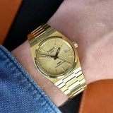  Shop Authentic Tissot PRX Powermatic 80 Gold Dial Gold Steel Strap Watch for Men - T137.207.33.021.00 - Luxxuri