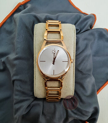  Shop Authentic Calvin Klein Stately Silver Dial Gold Steel Strap Watch for Women - K3G23526 - Luxxuri