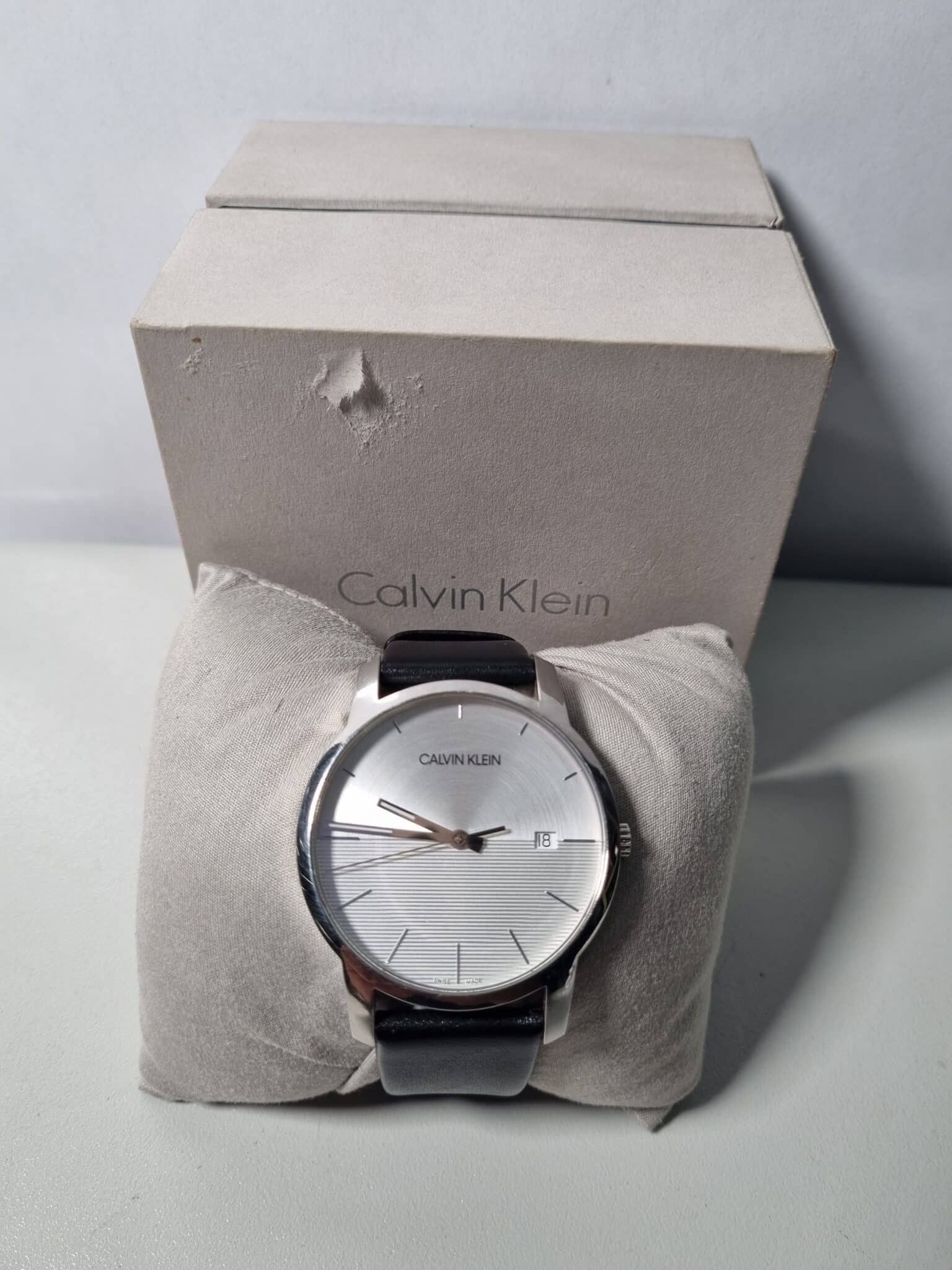  Shop Authentic Calvin Klein City White Dial Black Leather Strap Watch for Men - K2G2G1CD - Luxxuri