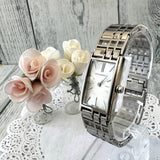  Shop Authentic Burberry Heritage Quartz White Dial Silver Steel Strap Watch For Women - BU9600 - Luxxuri