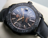  Shop Authentic Tag Heuer Aquaracer Calibre 5 Black NATO Strap Carbon Dial Watch for Men - WBD218A.FC6445 - Luxxuri