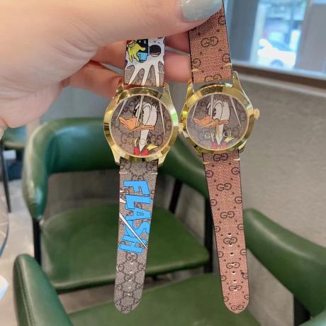  Shop Authentic Gucci G Timeless Disney Donald Duck Brown Dial Brown Leather Strap Watch For Women - YA1264167 - Luxxuri