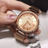  Shop Authentic Guess Soho Rose Gold Dial Stainless Steel Watch For Women - W0638L4 - Luxxuri