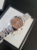 Shop Authentic Gucci Vintage Diamonds Brown Dial Silver Steel Strap Watch For Men - YA142409 - Luxxuri