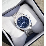  Shop Authentic Gucci GG2570 Quartz Blue Dial Silver Steel Strap Watch For Men - YA142303 - Luxxuri