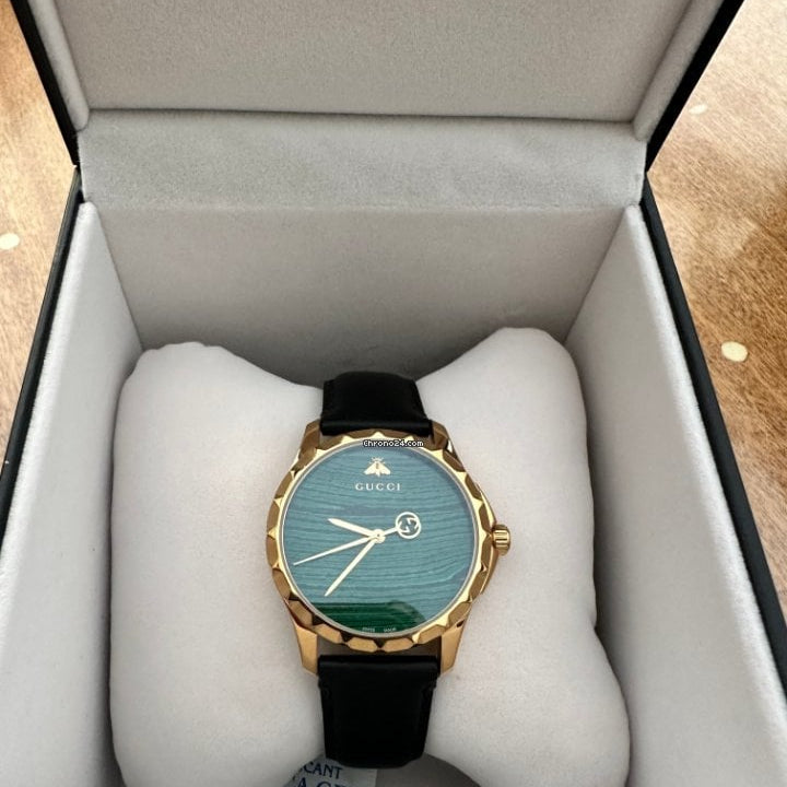  Shop Authentic Gucci Le Marche Des Merveilles Quartz Green Dial Black Leather Strap Watch For Women - YA126463 - Luxxuri