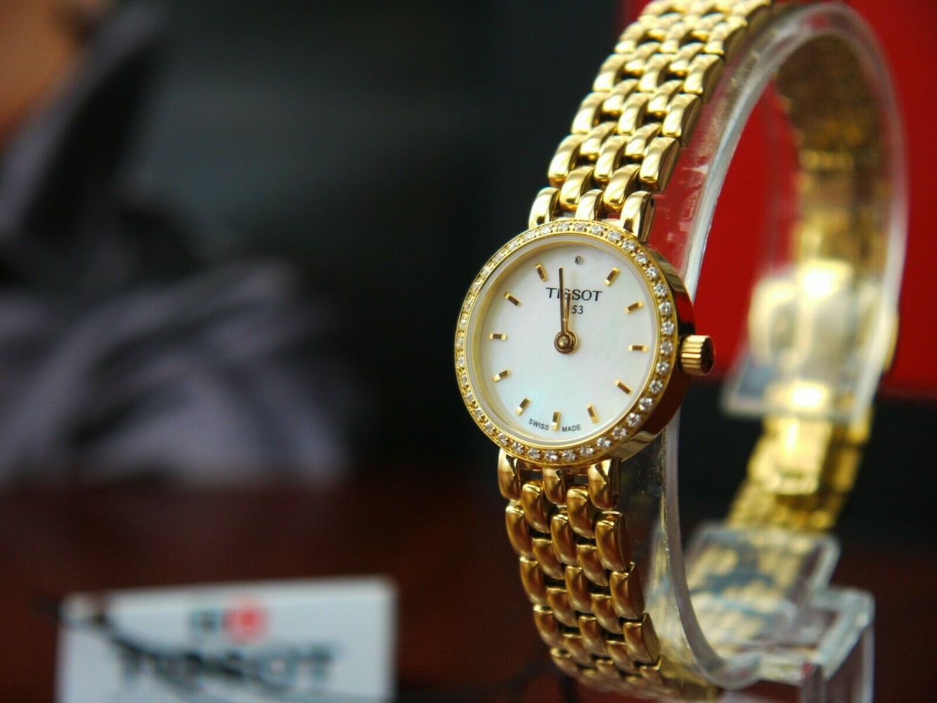  Shop Authentic Tissot T-Lady Lovely Mother of Pearl Dial Gold Steel Strap Watch For Women - T058.009.63.116.00 - Luxxuri