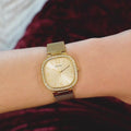 Guess Tapestry Diamonds Gold Dial Gold Mesh Bracelet Watch for Women - GW0354L2