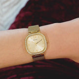  Shop Authentic Guess Tapestry Diamonds Gold Dial Gold Mesh Bracelet Watch for Women - GW0354L2 - Luxxuri