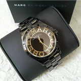  Shop Authentic Marc Jacobs Henry Transparent Black Dial Black Steel Strap Watch for Women - MBM3255 - Luxxuri