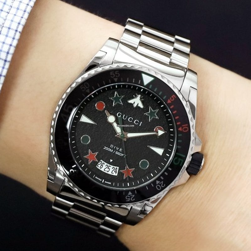  Shop Authentic Gucci Dive Quartz Black Dial Silver Steel Strap Watch For Men - YA136221 - Luxxuri