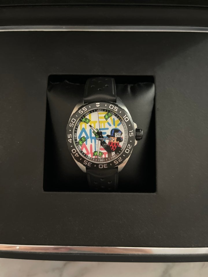  Shop Authentic Tag Heuer Formula 1 Alec Monopoly White Dial Watch for Men - WAZ1119.FT8023 - Luxxuri