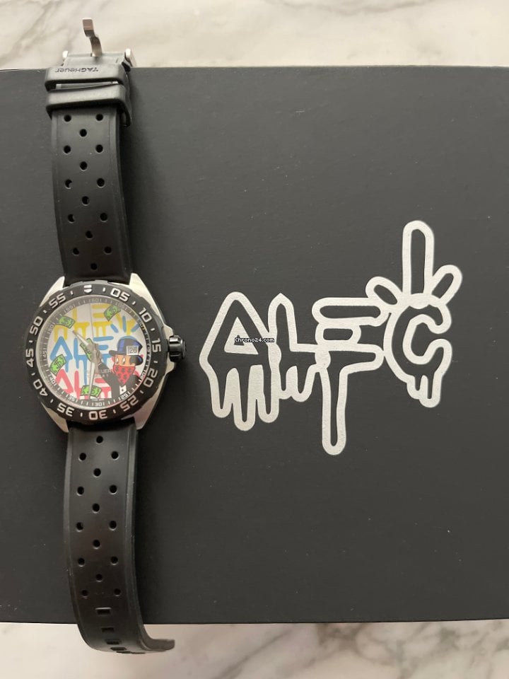  Shop Authentic Tag Heuer Formula 1 Alec Monopoly White Dial Watch for Men - WAZ1119.FT8023 - Luxxuri
