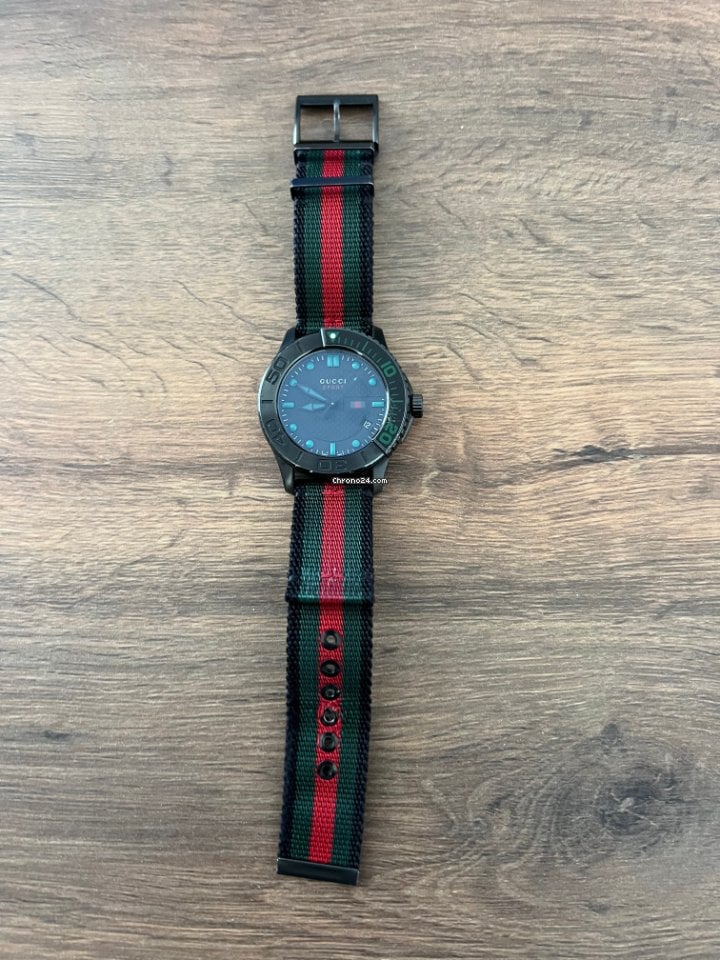  Shop Authentic Gucci G Timeless Sport Black Dial Two Tone NATO Strap Watch For Men - YA126229 - Luxxuri