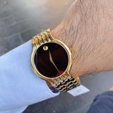  Shop Authentic Movado Veturi Quartz Black Dial Gold Steel Strap Watch for Men - 0606934 - Luxxuri