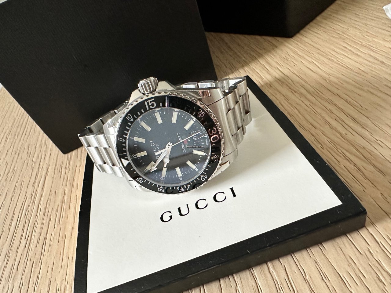  Shop Authentic Gucci Dive Quartz Black Dial Silver Steel Strap Watch For Men - YA136301A - Luxxuri
