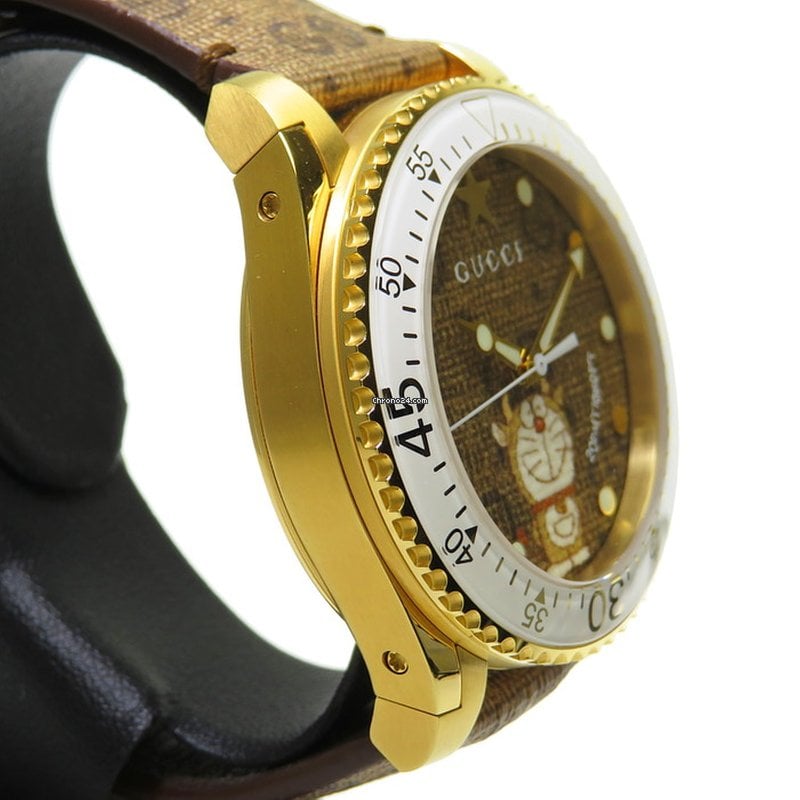  Shop Authentic Gucci Dive Doraemon Brown Dial Brown Leather Strap Watch For Men - YA136334 - Luxxuri