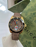  Shop Authentic Gucci Dive Doraemon Quartz Brown Dial Brown Leather Strap Watch For Men - YA136335 - Luxxuri