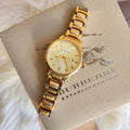  Shop Authentic Burberry The Classic Champagne Dial Gold Steel Strap Watch for Women - BU10109 - Luxxuri