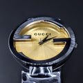  Shop Authentic Gucci Interlocking G Quartz Gold Dial Black Steel Strap Watch For Women - YA133314 - Luxxuri